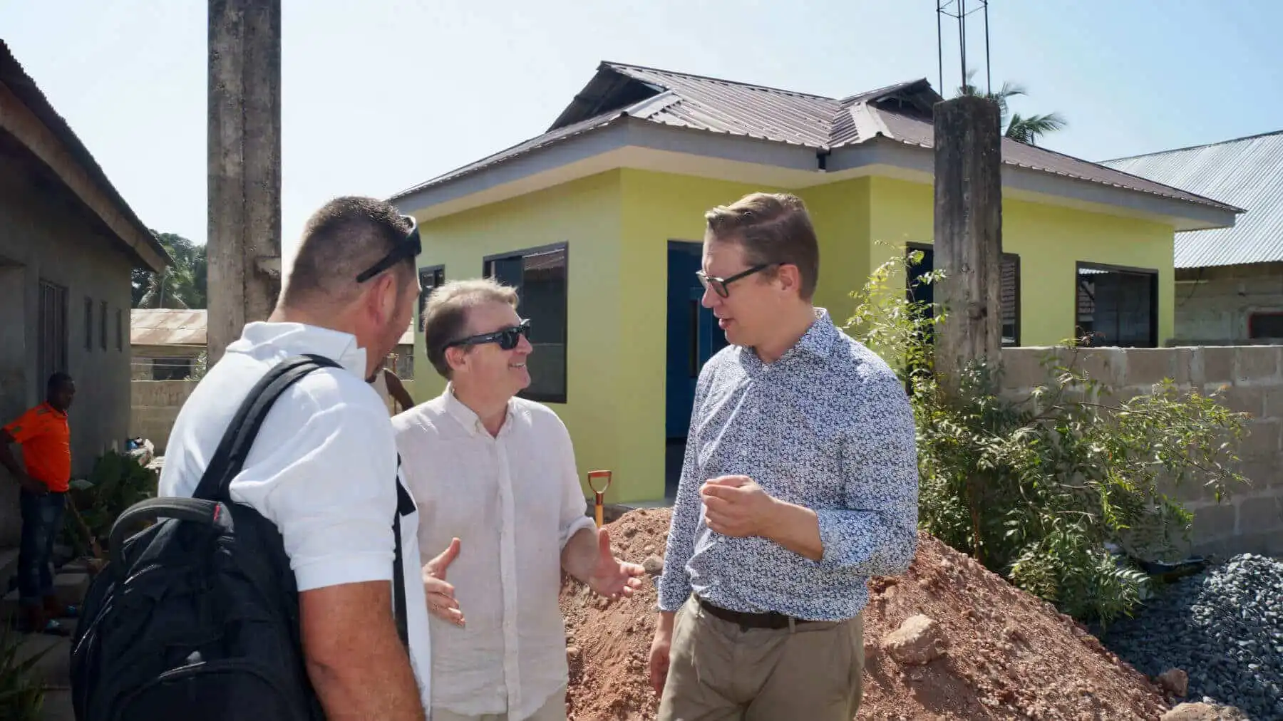 MTI investment founders talking while they are in a construction site