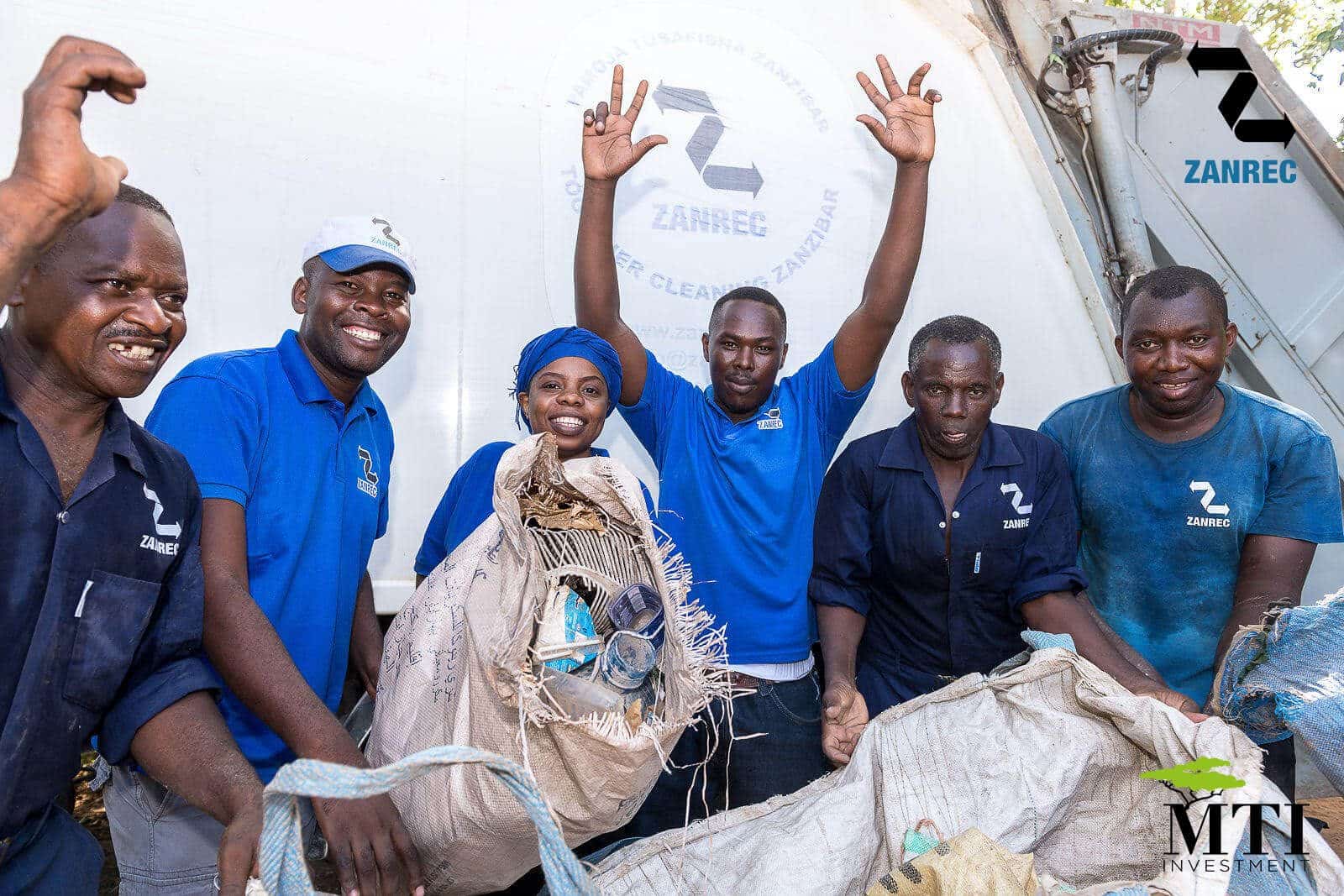 Zanrec team clebrating after cleanning and collecting rubbish