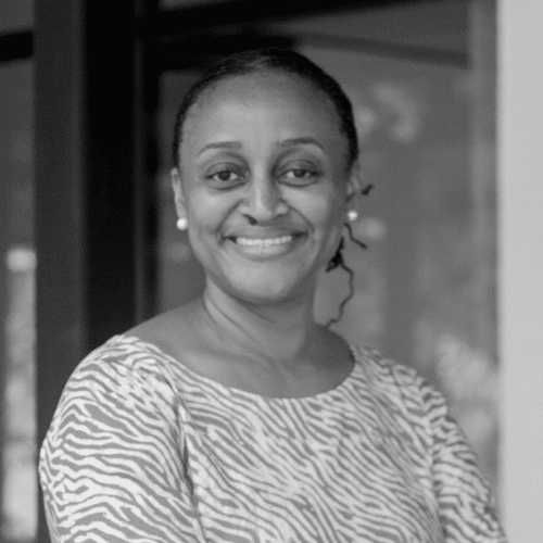 Black & white picture of a MTI investment employee name Neema