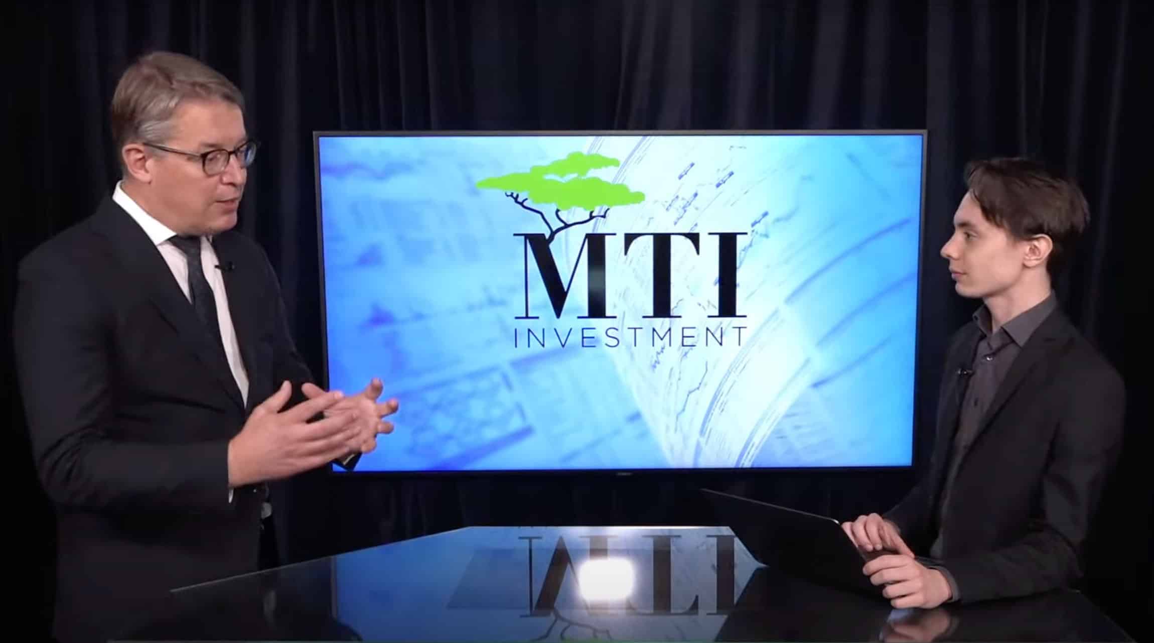 MTI Investment co founder presenting results of the company in a studio